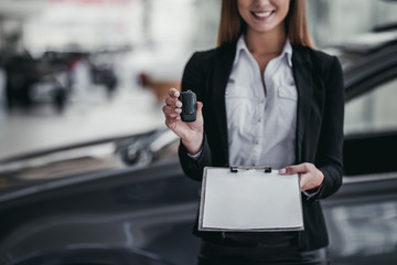 Salesperson at car dealership