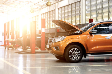 car repair station with soft-focus in the background and over light