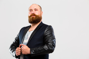 Proud brutal man with beard