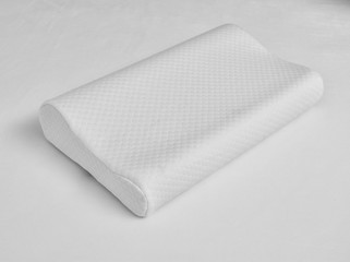 Orthopedic pillow on white background. Physiotherapy concept