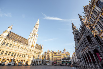 Morning view on the city hall at the Grand place central square in the old town of Brussels during the sunny weather in Belgium