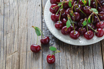 Fresh cherries on dish
