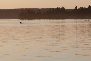 night seascape, sea before sunrise and pier stretching to the horizon