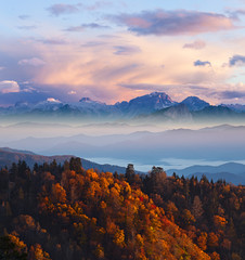 Cloudy colorfull sunrise at Alpine high mountains