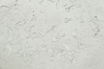 Old white cracked painted wall background texture