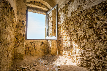 Window in old ruined fortress