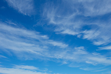Fluffy White Clouds on Bright Blue Sunny Summer Sky