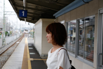 Obraz premium japanese yuong woman in station