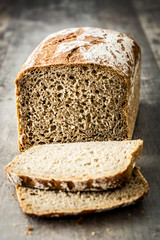 Rustic bread on wooden table