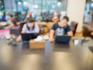 Abstract blur coffee shop and restaurant interior for background - can be used for display or montage your products.Mock up your products.Vintage filter.