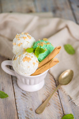 Vanilla and mint ice cream in cup