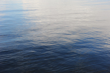Background of blue water surface with ripples © sorocka