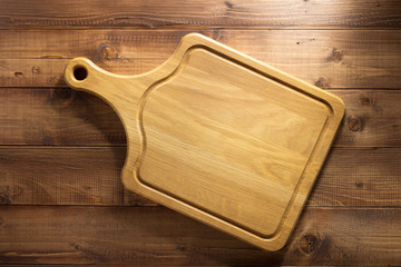 cutting board at wooden background