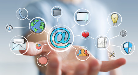 Businessman holding multimedia hand-drawn interface