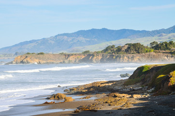 Central California coast with beach, cliffs and blue ocean in Big Sur