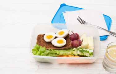Cut vegetables, sandwich in an open food container
