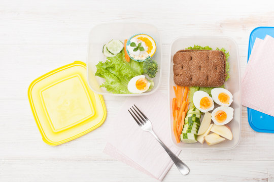 Cut vegetables, sandwich in an open food container