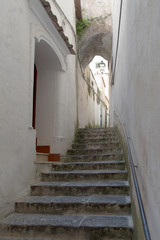 Fototapeta na wymiar Flight of steps at Italian narrow street