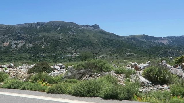 Road to mountain village Krasi on Crete /Greece. Driving along a road.