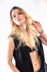 Obraz premium girl In jeans and bra on a White background