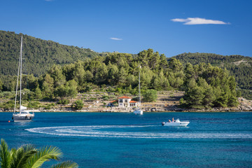 Yachts on blue lagoon bay at Croatia - 162250339