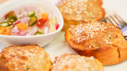 Toasted Baguette with minced pork spread, dip sauce delicious light meal snack, selective focus