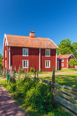 Old traditional red wooden Swedisch house