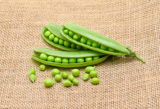  green peas on sack background
