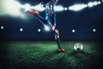 The active player of football at stadium in motion