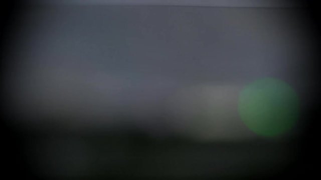 Flashing Lights on a Dark Background
