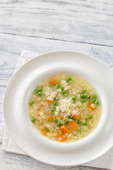 Italian chicken pasta soup with parmesan