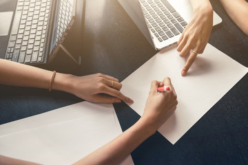 business woman with blank document paper work,planing and discussing business technology concept,teamwork business cooperation success,Selective focus,Light flare and vintage color tone.