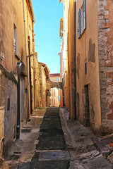 old and narrow street in Hyères - France