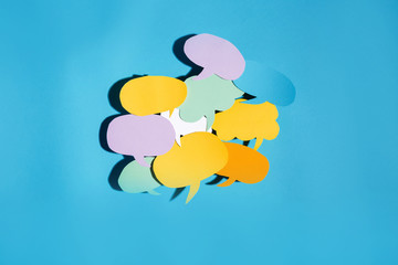 Speech bubble text message theme with hard shadow on a blue background