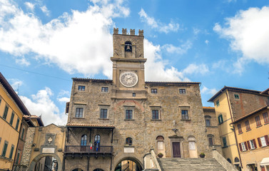 view of the town hall in the medieval city of Cortona