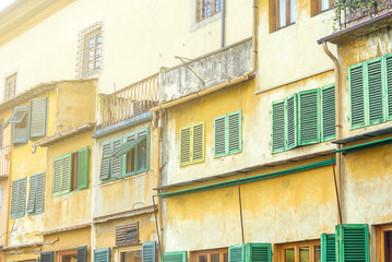 Fototapeta na wymiar View of windows and shutters on Ponte Vecchio, Florence