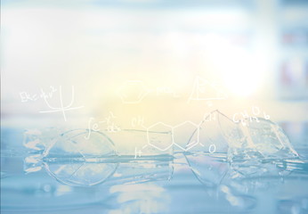 broken glassware in laboratory and science chemical structure formula background