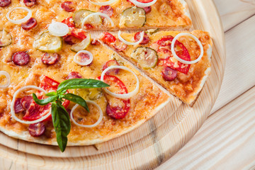 Assorted Pizza on the wooden background