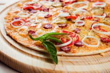 Assorted Pizza on the wooden background