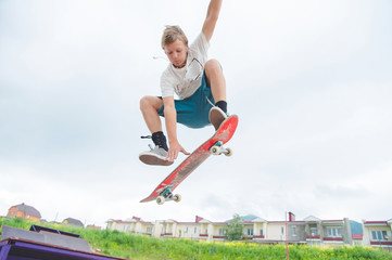 Young skateboarder in a jump