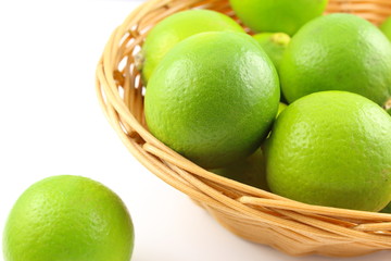 fresh lime fruits in a basket