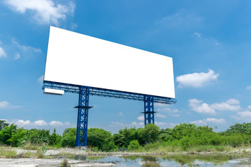 Blank billboard on a bright blue day  ready for new advertisement.