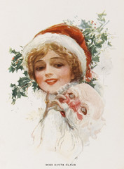 Woman wearing a Father Christmas hat. Date: circa 1911