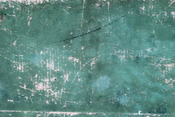 Grungy weathered paper book cover surface.
