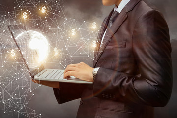 Businessman working on laptop in the network .