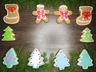 christmas cookies gingerbread and decoration on wooden background