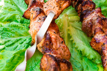 Cooking meat outdoors. Fried meat old recipe.