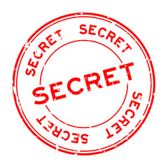 Grunge red secret round rubber seal stamp on white background