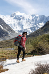 Traveller man adventure man hiking mountain with backpack