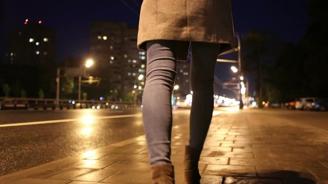 Woman Goes Along the Night Street, Shot on Canon EOS 5D Mark IV in Slow Motion. HD 1080